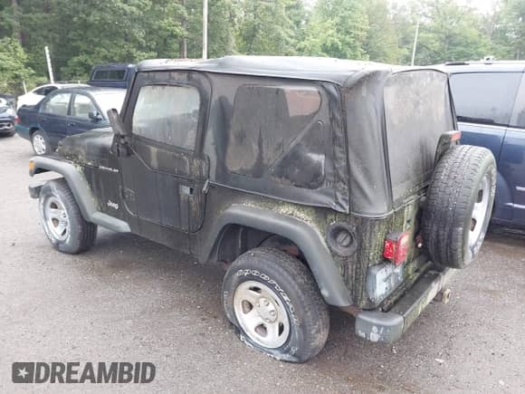 2002 Jeep Wrangler X z VIN 1J4FA39S22P758455, wystawiony jako IAAI lot #43038935 z przebiegiem Nie podano mil oraz . Historia ofert i sprzedaży dostępna na DreamBid. Obrazek 3.