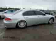 2004 BMW 7 Series 745i with VIN WBAGL634X4DP70421, listed as a Copart auction lot 73309744 with 123,457 mi miles and Salvage title. Bid and sale history available at DreamBid. Image 3.