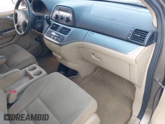 2009 Honda Odyssey EX with VIN 5FNRL38429B050727, listed as a IAAI auction lot 43100771 with 158,636 mi miles and . Bid and sale history available at DreamBid. Image 5.