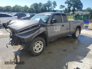 2003 Dodge Dakota with VIN 1D7HL12X93S223100, listed as a Copart auction lot 66331435 with 145,764 mi miles and Salvage title. Bid and sale history available at DreamBid. Image 1.