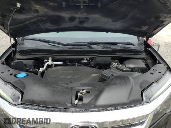 2021 Honda Pilot EX-L with VIN 5FNYF5H50MB044229, listed as a Copart auction lot 62938435 with 54,965 mi miles and Salvage title. Bid and sale history available at DreamBid. Image 12.