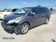 2015 Toyota Sienna LE with VIN 5TDKK3DC0FS647058, listed as a Copart auction lot 70113535 with 206,500 mi miles and Salvage title. Bid and sale history available at DreamBid. Image 1.