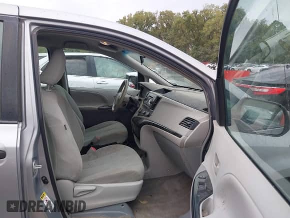 2014 Toyota Sienna L with VIN 5TDZK3DCXES497697, listed as a IAAI auction lot 43397896 with 247,187 mi miles and . Bid and sale history available at DreamBid. Image 5.