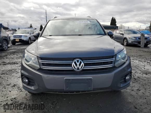 2013 Volkswagen Tiguan SE z VIN WVGAV3AX2DW607051, wystawiony jako Copart lot #44391625 z przebiegiem 61 220 mil mil oraz Szkoda całkowita • Salvage title. Historia ofert i sprzedaży dostępna na DreamBid. Obrazek 5.