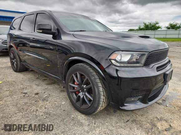 2018 Dodge Durango SRT with VIN 1C4SDJGJ9JC209514, listed as a Copart auction lot 65048025 with 51,573 mi miles and Salvage title. Bid and sale history available at DreamBid. Image 4.