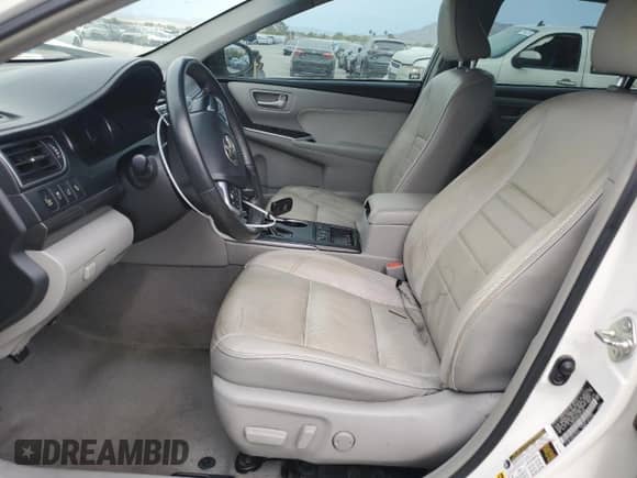 2015 Toyota Camry LE с VIN 4T1BD1FKXFU167796, выставлен на аукционе Copart как лот 70953095 с пробегом 128 819 миль миль и Списание • Salvage title. История ставок и продаж доступна на DreamBid. Изображение 7.
