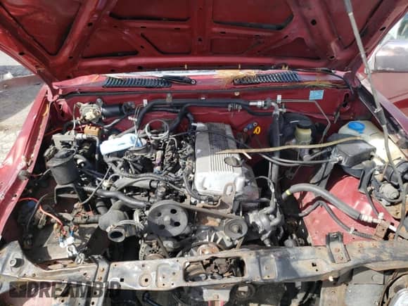 1996 Nissan Frontier XE with VIN 1N6SD16S8TC335129, listed as a Copart auction lot 55884495 with 313,757 mi miles and Salvage title. Bid and sale history available at DreamBid. Image 11.