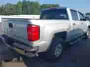 2014 Chevrolet Silverado 1500 LT with VIN 3GCPCREHXEG259073, listed as a IAAI auction lot 43010013 with 128,000 mi miles and . Bid and sale history available at DreamBid. Image 4.