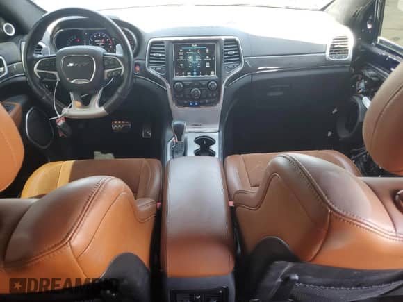 2018 Jeep Grand Cherokee SRT with VIN 1C4RJFDJXJC299443, listed as a Copart auction lot 71565105 with 44,211 mi miles and Salvage title. Bid and sale history available at DreamBid. Image 8.