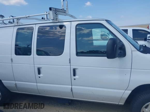 2014 Ford Econoline Cargo Commercial with VIN 1FTNE1EW4EDB15338, listed as a IAAI auction lot 42530382 with 185,886 mi miles and . Bid and sale history available at DreamBid. Image 13.