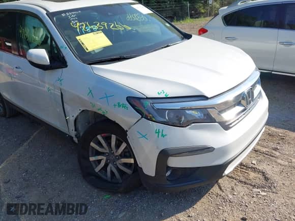 2022 Honda Pilot EX-L with VIN 5FNYF6H5XNB020818, listed as a IAAI auction lot 42639266 with 47,314 mi miles and . Bid and sale history available at DreamBid. Image 6.