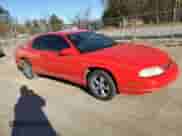 1998 Chevrolet Monte Carlo LS with VIN 2G1WW12M8W9198297, listed as a Copart auction lot 84427294 with 102,693 mi miles and Salvage title. Bid and sale history available at DreamBid. Image 4.
