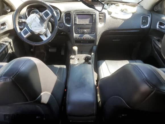 2012 Dodge Durango Citadel with VIN 1C4SDJET9CC360683, listed as a Copart auction lot 68299105 with 184,171 mi miles and Salvage title. Bid and sale history available at DreamBid. Image 8.