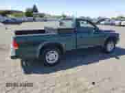 2002 Dodge Dakota with VIN 1B7FL16XX2S669623, listed as a Copart auction lot 62144655 with 195,986 mi miles and Clean title. Bid and sale history available at DreamBid. Image 3.