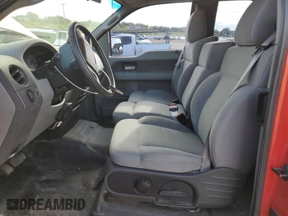 2007 Ford F-150 STX with VIN 1FTRX12W87KD46533, listed as a Copart auction lot 84247045 with 125,004 mi miles and Salvage title. Bid and sale history available at DreamBid. Image 7.