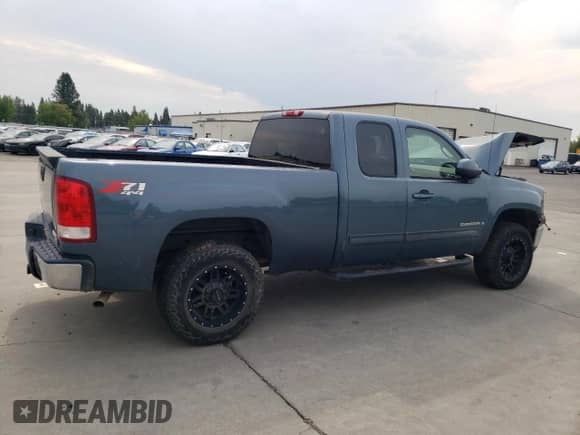 2007 GMC Sierra 1500 SLT с VIN 1GTEK19J37Z639755, выставлен на аукционе Copart как лот 69992525 с пробегом Не указан миль и Списание • Salvage title. История ставок и продаж доступна на DreamBid. Изображение 3.