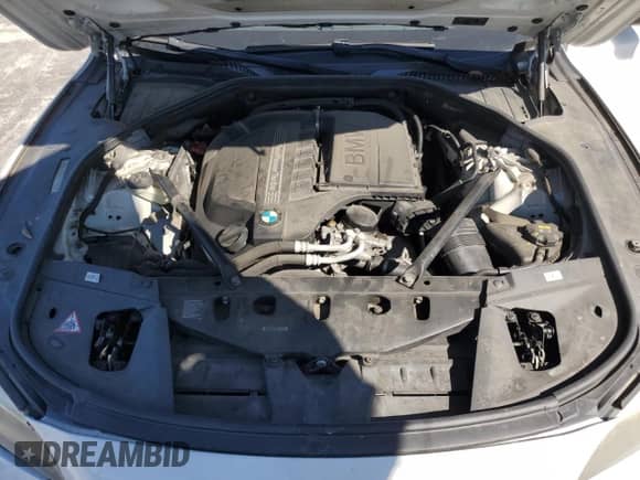 2014 BMW 7 Series 740i с VIN WBAYA6C50ED144560, выставлен на аукционе Copart как лот 64113155 с пробегом 122 004 миль миль и Списание • Salvage title. История ставок и продаж доступна на DreamBid. Изображение 11.