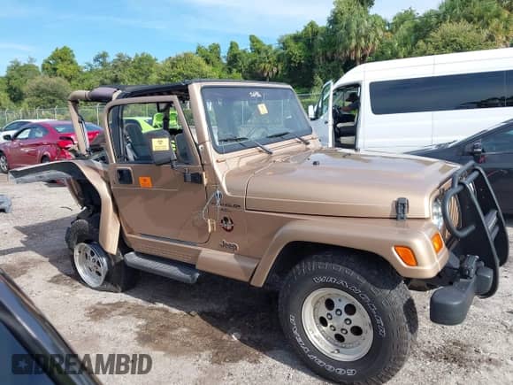 1999 Jeep Wrangler Sahara с VIN 1J4FY49S1XP428301, выставлен на аукционе IAAI как лот 43193956 с пробегом 55 579 миль миль и . История ставок и продаж доступна на DreamBid. Изображение 13.