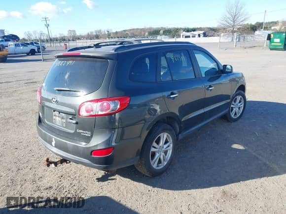 2010 Hyundai Santa Fe Limited with VIN 5NMSKDAG8AH340679, listed as a IAAI auction lot 41883491 with 239,532 mi miles and . Bid and sale history available at DreamBid. Image 4.