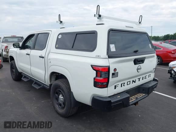 2022 Nissan Frontier S with VIN 1N6ED1EK0NN608408, listed as a IAAI auction lot 43023099 with 39,439 mi miles and . Bid and sale history available at DreamBid. Image 3.