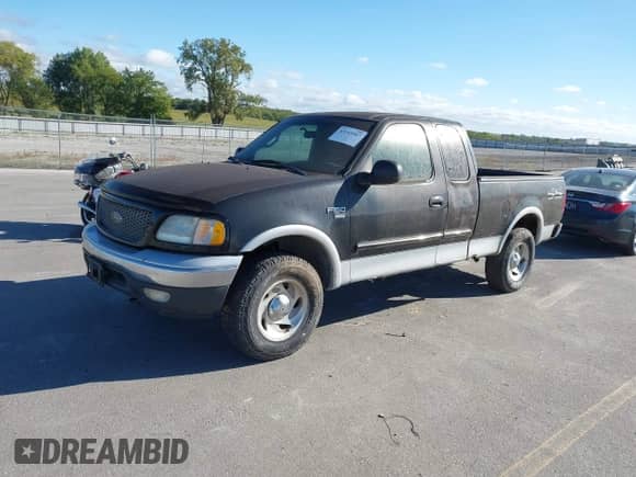 2000 Ford F-150 XL with VIN 1FTRX18LXYNB99306, listed as a IAAI auction lot 43143507 with Not provided miles and . Bid and sale history available at DreamBid. Image 2.