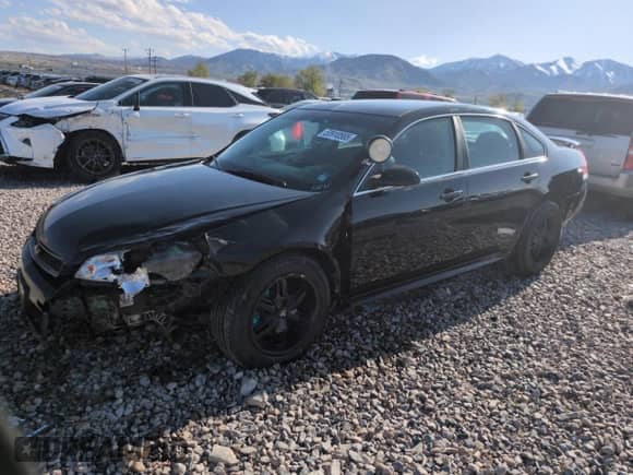 2013 Chevrolet Impala Police with VIN 2G1WD5E3XD1162414, listed as a Copart auction lot 53910565 with 146,081 mi miles and Salvage title. Bid and sale history available at DreamBid. Image 1.