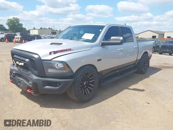 2016 Ram 1500 Rebel z VIN 1C6RR7YT2GS315201, wystawiony jako IAAI lot #43059918 z przebiegiem 201 857 mil mil oraz . Historia ofert i sprzedaży dostępna na DreamBid. Obrazek 2.