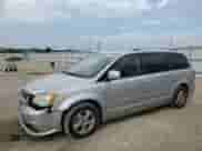 2011 Dodge Grand Caravan Crew with VIN 2D4RN5DG6BR689258, listed as a Copart auction lot 80556795 with 149,320 mi miles and Salvage title. Bid and sale history available at DreamBid. Image 1.