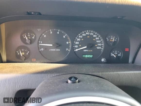 1999 Jeep Grand Cherokee Limited с VIN 1J4GW68N0XC685779, выставлен на аукционе Copart как лот 68852365 с пробегом 148 892 миль миль и Списание • Salvage title. История ставок и продаж доступна на DreamBid. Изображение 9.