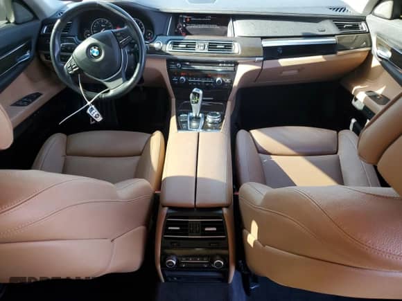 2014 BMW 7 Series 740i с VIN WBAYA6C58ED826697, выставлен на аукционе Copart как лот 57130385 с пробегом 50 107 миль миль и Списание • Salvage title. История ставок и продаж доступна на DreamBid. Изображение 8.