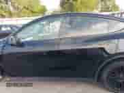 2023 Tesla Model Y Long Range z VIN 7SAYGAEE7PF767951, wystawiony jako IAAI lot #43128878 z przebiegiem 36 431 mil mil oraz . Historia ofert i sprzedaży dostępna na DreamBid. Obrazek 14.