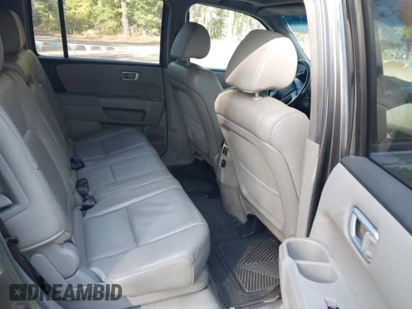 2013 Honda Pilot EX-L with VIN 5FNYF4H57DB010542, listed as a IAAI auction lot 43286663 with 140,708 mi miles and . Bid and sale history available at DreamBid. Image 8.