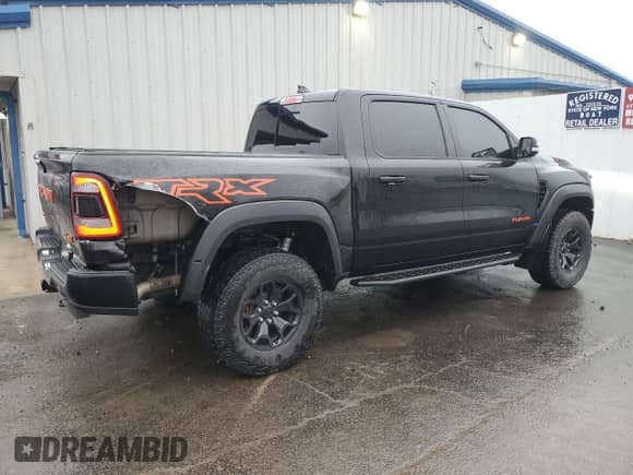 2021 Ram 1500 TRX с VIN 1C6SRFU99MN758770, выставлен на аукционе Copart как лот 52928765 с пробегом 59 155 миль миль и Списание • Salvage title. История ставок и продаж доступна на DreamBid. Изображение 3.