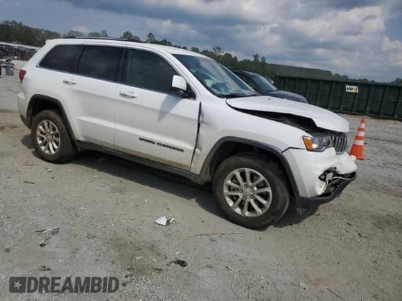 2021 Jeep Grand Cherokee Laredo E with VIN 1C4RJFAG9MC731727, listed as a Copart auction lot 69651455 with 33,180 mi miles and Salvage title. Bid and sale history available at DreamBid. Image 4.