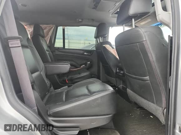 2017 Chevrolet Tahoe Premier with VIN 1GNSKCKC8HR310276, listed as a Copart auction lot 82426675 with 125,835 mi miles and Salvage title. Bid and sale history available at DreamBid. Image 11.