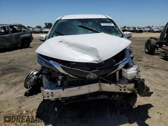 2023 Toyota Sienna LE with VIN 5TDKRKEC7PS140311, listed as a Copart auction lot 63260024 with 64,706 mi miles and Salvage title. Bid and sale history available at DreamBid. Image 5.