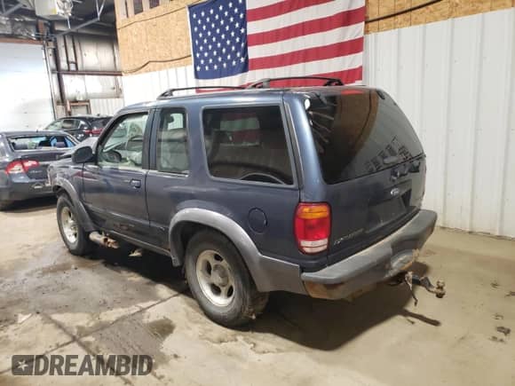 1999 Ford Explorer Sport с VIN 1FMYU24E5XUC26073, выставлен на аукционе Copart как лот 86696925 с пробегом 179 188 миль миль и На запчасти • Non repairable. История ставок и продаж доступна на DreamBid. Изображение 2.