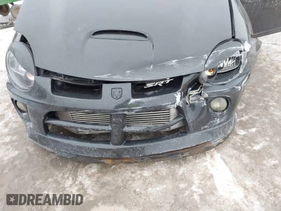 2004 Dodge Neon SRT-4 z VIN 1B3ES66S94D642373, wystawiony jako IAAI lot #41559811 z przebiegiem 114 865 mil mil oraz . Historia ofert i sprzedaży dostępna na DreamBid. Obrazek 6.