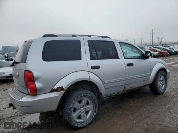 2007 Dodge Durango Limited with VIN 1D8HB58257F531655, listed as a Copart auction lot 86636204 with 192,500 mi miles and Salvage title. Bid and sale history available at DreamBid. Image 3.