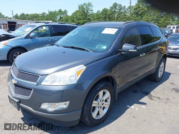 2012 Chevrolet Traverse 1LT z VIN 1GNKVGED9CJ277606, wystawiony jako IAAI lot #42864068 z przebiegiem 139 446 mil mil oraz . Historia ofert i sprzedaży dostępna na DreamBid. Obrazek 18.