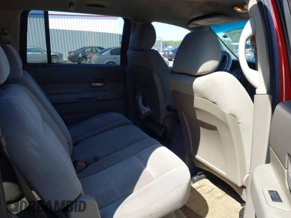 2004 Dodge Durango SLT z VIN 1D4HD48N64F154104, wystawiony jako IAAI lot #43167113 z przebiegiem 191 883 mil mil oraz . Historia ofert i sprzedaży dostępna na DreamBid. Obrazek 8.