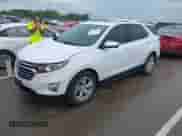 2021 Chevrolet Equinox Premier with VIN 3GNAXNEV5MS160043, listed as a IAAI auction lot 42109564 with 36,808 mi miles and . Bid and sale history available at DreamBid. Image 2.