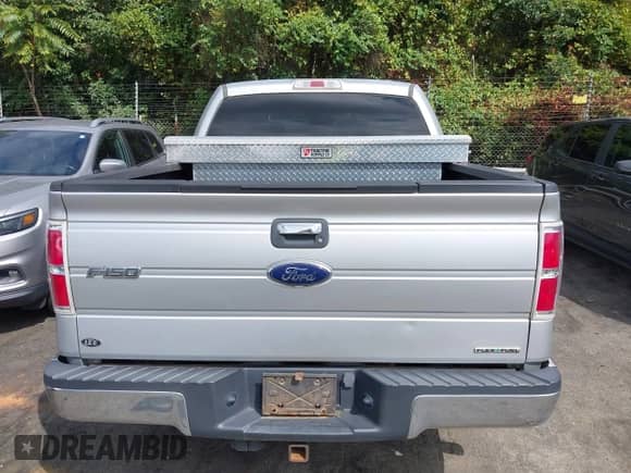 2013 Ford F-150 XL with VIN 1FTFW1CF9DFA85891, listed as a IAAI auction lot 43187833 with 194,635 mi miles and . Bid and sale history available at DreamBid. Image 16.