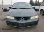 2004 Honda Odyssey LX with VIN 5FNRL18574B137609, listed as a Copart auction lot 68292805 with 172,873 mi miles and Salvage title. Bid and sale history available at DreamBid. Image 5.