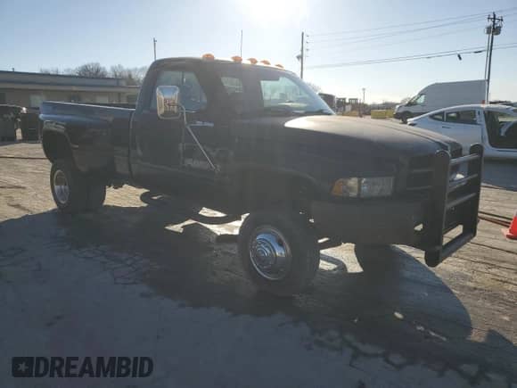 1999 Dodge RAM with VIN 3B7MF36W5XM514348, listed as a Copart auction lot 48015555 with 172,310 mi miles and Salvage title. Bid and sale history available at DreamBid. Image 4.