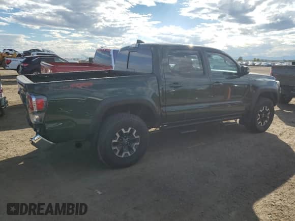 2022 Toyota Tacoma SR с VIN 3TMCZ5AN7NM519528, выставлен на аукционе Copart как лот 84897605 с пробегом 26 429 миль миль и Списание • Salvage title. История ставок и продаж доступна на DreamBid. Изображение 3.