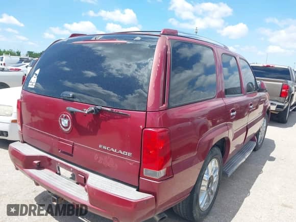 2006 Cadillac Escalade z VIN 1GYEC63N16R153041, wystawiony jako IAAI lot #42141937 z przebiegiem 278 583 mil mil oraz . Historia ofert i sprzedaży dostępna na DreamBid. Obrazek 4.