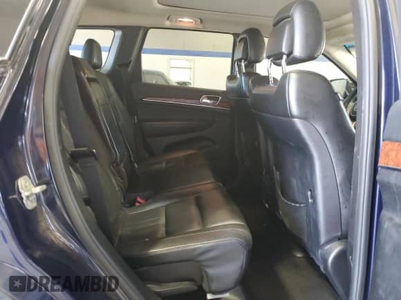 2012 Jeep Grand Cherokee Limited z VIN 1C4RJFBG8CC292498, wystawiony jako Copart lot #71521035 z przebiegiem 167 955 mil mil oraz Szkoda całkowita • Salvage title. Historia ofert i sprzedaży dostępna na DreamBid. Obrazek 11.