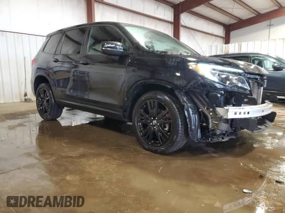 2019 Honda Passport Sport with VIN 5FNYF8H28KB012374, listed as a Copart auction lot 87403785 with 55,683 mi miles and Salvage title. Bid and sale history available at DreamBid. Image 4.