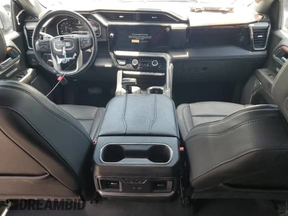 2023 GMC Sierra 1500 Denali z VIN 1GTUUGED7PZ270231, wystawiony jako Copart lot #58398935 z przebiegiem 14 572 mil mil oraz Nie do naprawy • Non repairable. Historia ofert i sprzedaży dostępna na DreamBid. Obrazek 8.